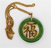 Gold and jade pendant on chain
