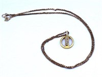 Gold and diamond pendant and chain