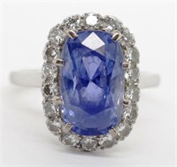 Sapphire, diamond, platinum and gold halo ring