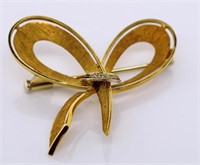 18ct gold ribbon brooch