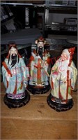 Three Oriental figurines one has some damage