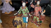 Pair of Oriental lady figurines missing some