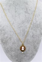 Gold, cameo and pearl pendant on chain