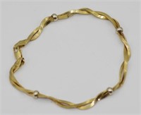 Delicate 18ct yellow gold twist bracelet