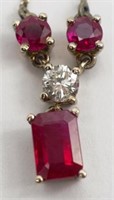 Ruby, diamond and 18ct gold pendant and chain