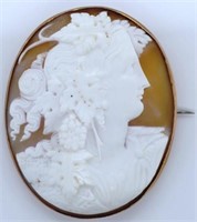 A large antique cameo and 9ct gold brooch.