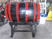 Wooden barrel on stand