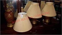 Three lamps missing finial tops