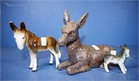 Three various porcelain donkey figurines