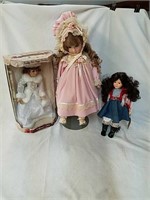 Three beautiful collectible porcelain dolls