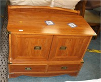Light cherry wood coloured cabinet