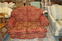 Two seater sofa in crimson and gold brocade