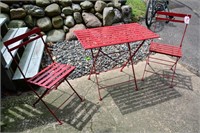 Red metal folding table + 2 chairs