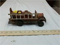 Old cast fire truck with ladder