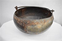 Primitve Metal Boiling Pot