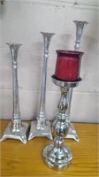 4 METAL CANDLE STANDS