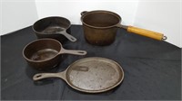 4 CAST IRON POTS AND SKILLETS
