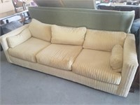 retro couch. stain on left arm