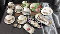 Group of cups and saucers and dishes