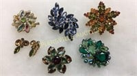 Group of vintage broaches and earrings