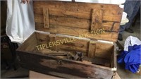 wooden toolbox with primitive tools