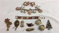 Group of vintage costume jewelry and broaches