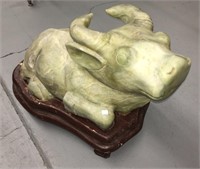 Jade Sculpture On Wooden Base