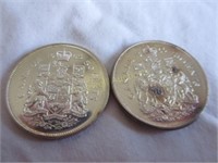 Two Canadian 50 cent coins - 1966 & 1965
