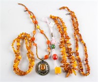 5 Assorted Chinese Amber Necklaces and Toggle