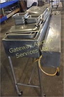 Hot food server with serving trays and heat lamps