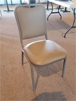 (24) Grey Cushioned Stackable Chairs