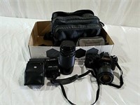 Canon 35 millimeter camera with accessories