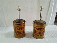 Two vintage advertising can lamps