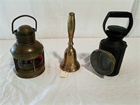 Two lamps and a bell