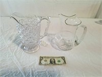 Two glass pitcher's
