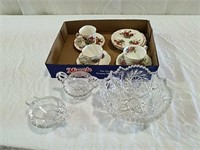 Cut glass pieces and cups and saucers