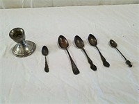 Silver spoons and candle holder all marked