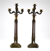 Pair of patinated French bronze candelabra