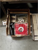 Box  Of 45 records, sports cards and miscellaneous