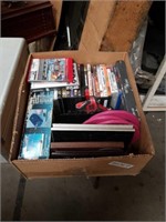 Box of DVD's and picture frames