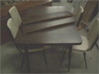 Vintage table and four chairs. Two leaves