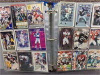 BINDER OF SPORTS TRADING CARDS