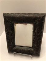 A beautiful decorative wooden mirror