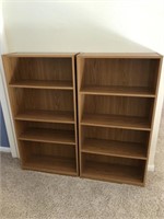 Lot 2 brown matching book shelves