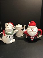 A lot of Whimsical holiday tea pots