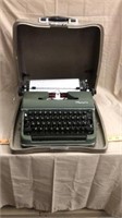 Olympia type writer with case