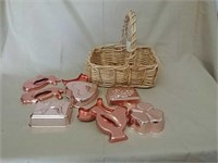 Wicker basket with antique cookie cutters