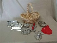 Wicker basket with antique cookie cutters