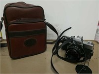 Minolta SRT101 camera with camera bag