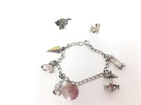 Silver Charm Bracelet and Two Charms
